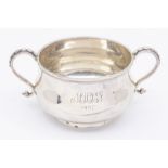 ***RE-OFFER JULY A&C £40-60** An Arts & Crafts silver porringer, plain body on on rim foot, engraved