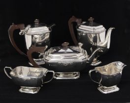 An Elizabeth II silver matched five piece silver tea and coffee service to include: teapot, sugar