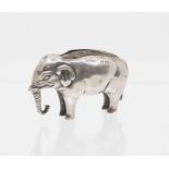 An Edwardian silver novelty pin cushion cast in the form of an Elephant, hallmarked by Spurrier &