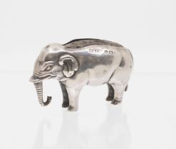 An Edwardian silver novelty pin cushion cast in the form of an Elephant, hallmarked by Spurrier &
