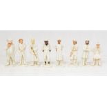 A set of eight Royal Worcester male Figures of the World designed by James Hadley, faces and hands