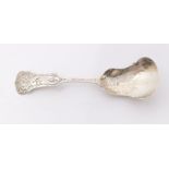 A 19th Century Dutch 833 standard caddy spoon, shaped terminal with engraved decoration, makers'