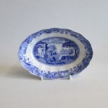 A 20th century Spode ‘Italian’ blue and White oval scalloped dish Date 20th century Size 15x10.5cm