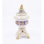 An S & H Derby King St pedestal pot potpourri vase and cover, decorated with applied flowers and