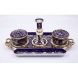 A 19th century Derby blue ground writing stand, decorated with gilt swags on a dark blue ground blue