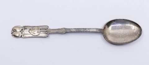 A 1930s Liberty & Co silver teaspoon in the Medea pattern designed by Archibold Knox, the terminal