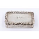 A George III silver snuff box, with cast scrolling flower and foliate border above reeded sides, the