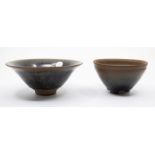 Two Jian style 'hares fur' tea bowls, 20th century, each covered in a black and brown streaky glaze,