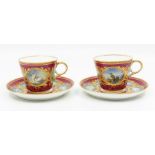 A pair of late 19th Century Copeland (1851-1895) porcelain cups and saucers, cerise pink grounds