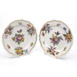 A pair of Derby silver shaped dessert plates, c.1815, decorated with flower groups in the style of