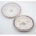 A blue mark Derby soup dish, decorated with a puce border above green swags and red roses, blue