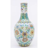 A Chinese doucai ‘lotus and bajixiang’ bottle vase, Qianlong seal mark and possibly of the period,