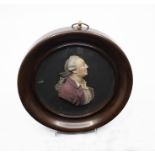 A George III coloured wax relief bust portrait of a Gentleman in profile possibly that of David
