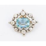 ***AUCTIONEER TO ANNOUNCE SMALL CHIP TO ONE SMALL DIAMOND GIRDLE*** A Belle Époque aquamarine and
