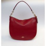 A Coach, red, pebbled leather Chelsea 32 hobo in new condition with gold hardware, shoulder strap