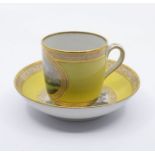 A good Billingsley Mansfield decorated yellow ground coffee cup and saucer, WXXX factory,