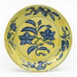 Perhaps Chinese Ming Dynasty; an Imperial made Chinese under glaze, blue yellow ground dish/