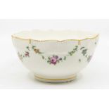 A Chelsea Derby large bowl, anchor and D mark in gold, decorated with flower swags suspended from