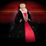 An iconic dress worn by Dame Barbara Windsor. A black beaded top and skirt with crinoline and