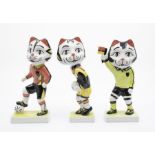 A collection of three Lorna Bailey Footballer cats including: Striker, Goalkeeper and Referee,