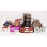 A collection of 8 branded boxed boots and shoes, all size 4