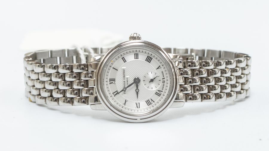 A ladies Frederique Constant steel ladies wristwatch, comprising a round silvered dial with - Image 2 of 2