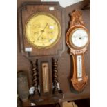 Two early 20th Century wall barometers in oak, one with brass face