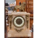 Late 19th Century marble French mantle clock, with two garnitures, on stands