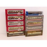 OO Gauge: A collection of ten assorted boxed Mainline and Dapol, OO Gauge coaches. General wear