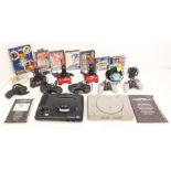 Video Games: An unboxed Sega Mega Drive console, complete with cables, three controllers, three
