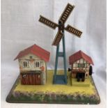 Tinplate: An unboxed tinplate, Bing, Germany, example of a windmill, including pulleys for