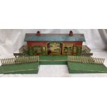 Hornby: A vintage tinplate O gauge Hornby Windsor Station c1925, with both end ramps. Rare station