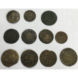 Small collection of jeton token coins from France, Germany and the Mediterranean.