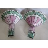 A pair of art deco style wall lights , in green pink and white . 37cm x 43cm