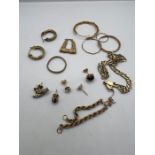 A selection of yellow metal items, assessed as 9ct gold, to include a pair of good condition stone