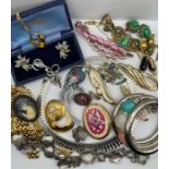 A large collection of costume jewellery comprising of a jewellery box full of necklaces, faux