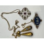 A brooch, pendant and screwback earrings. An early 20th century Wedgewood plaque brooch in yellow