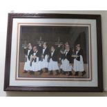 A large print of wine waiters carrying trays of wine and glasses . 50cm x 66cm