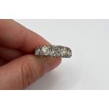 A stunning Victorian five stone old European cut diamond half hoop ring, with an estimated 3.1
