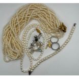 A set of sterling silver jewellery and strands of cultured pearl jewellery: to include a ten