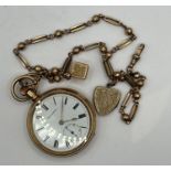 A gold plated Whitehall pocket watch along with a gilt Albert chain with attached cube charm and