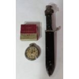 A chrome pocket watch and a sheaf knife damage to the pocket watch