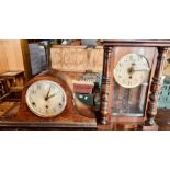An early 20th century oak mantle; another Vienna mahogany clock (2)