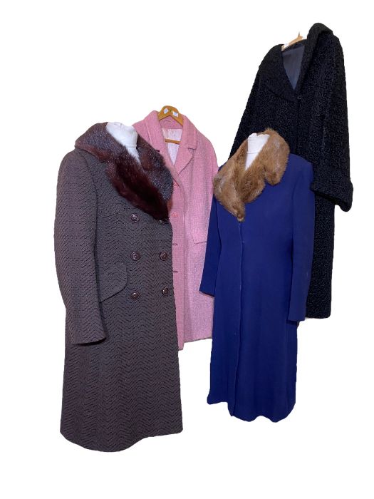 4 vintage coats to include a 60s coat in navy blue with beaver fur collar, a brown 60s coat with