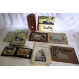 Collection of ephemera and an old postcard album , to include souvenirs booklets from Montreal ,