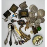 An interesting collection of tourist jewellery to include metal photo books, rosary books, a