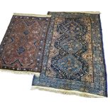 2 vintage wool rugs, one with a small mark 127x84cm and another 160x106 aprox (2)