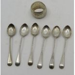 A set of Silver coffee spoons , Sheffied 1942 and a silver napkin ring Birmingham 1911 , 106 grams