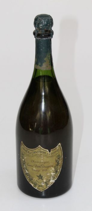 A single bottle of Moet et Chandon, Dom Perignon 1969 Vintage Champagne. Level into neck, some