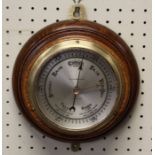 M Stone and Son, Liverpool, an early 20th century oak cased aneroid barometer, 20cm diameter